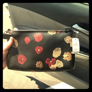 NWT Coach clutch! MSRP $175 selling for $50!